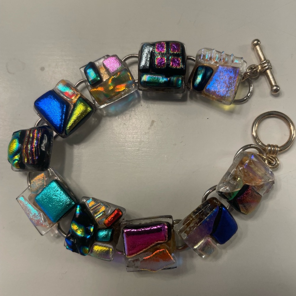Dichroic glass 8" bracelet. 1/2" glass squares infused with stacked metal.